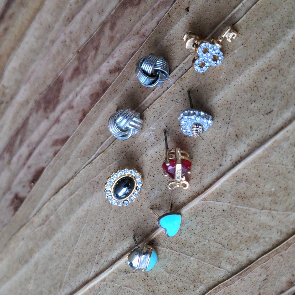 Set of 8 vintage single stud earrings, some designer